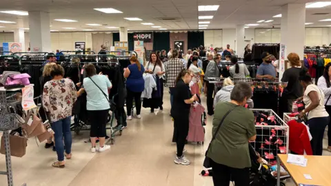 Jasmine DuFraisse/BBC Shoppers at the £1school uniform sale