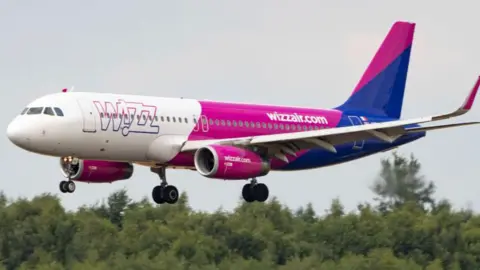Getty Images Wizz Air Airbus A320-200 aircraft as seen flying, landing and taxing at Eindhoven Airport while it is arriving from Bucharest.